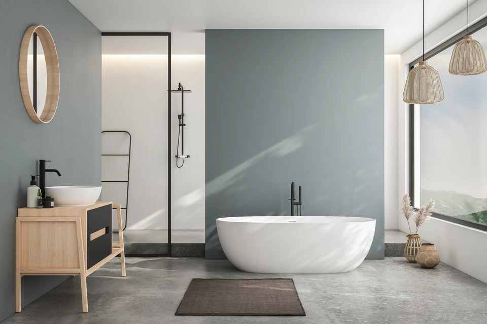 salle de bains contemporaine avec baignoire en grès et crépi blanc